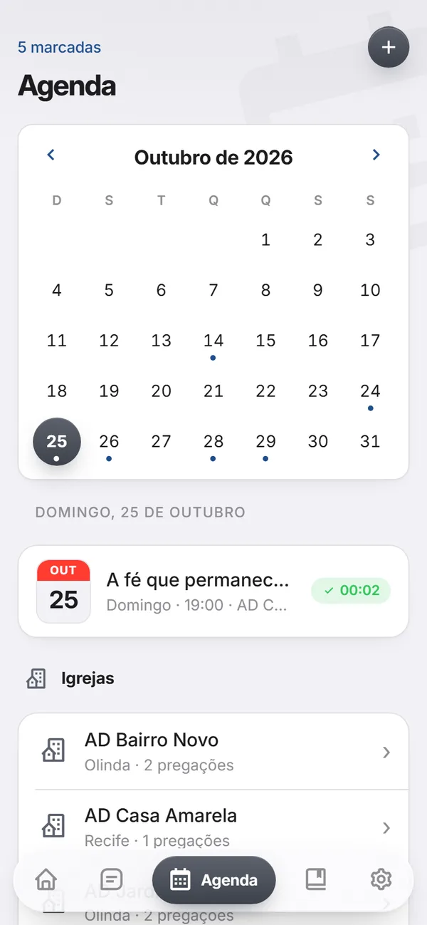 Agenda com o calendário de outubro e as igrejas